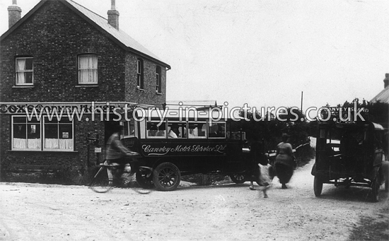 Buses passing Cox's Corner House, Canvey Island. Essex. c.1930's